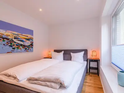 Ferienwohnung Inselpirat Malchow Blick in eines der Schlafzimmer