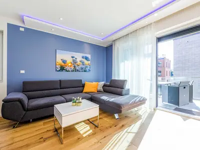 Ferienwohnung SeeGlück Wohnbereich mit Zugang zum Balkon