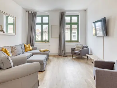 Ferienwohnung Family Suite Blick in das Wohnzimmer