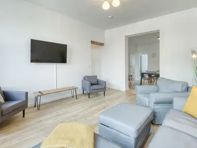 Ferienwohnung Family Suite Wohnbereich mit TV