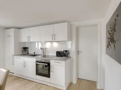 Ferienwohnung City Suite Blick auf die Küche