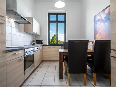Ferienwohnung InselLiebe in Malchow Küche mit Esstisch