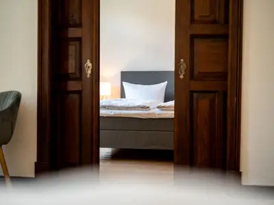 Ferienwohnung InselLiebe in Malchow Blick in eines der Schlafzimmer