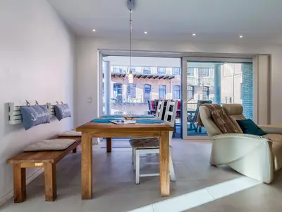 Ferienwohnung Pusteblume in Malchow Wohnbereich mit Zugang zum Balkon