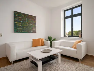 Ferienwohnung SeaView Malchow Wohnzimmer mit bequemem Sofa