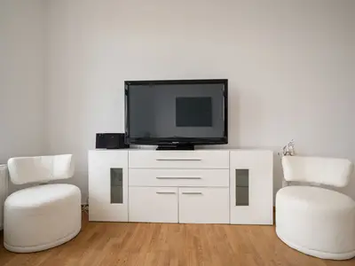 Ferienwohnung SeaView Malchow Wohnzimmer mit TV-Wand