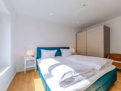 Ferienwohnung Inselzauber in Malchow - Blick in eines der Schlafzimmer