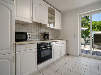 Apartment Strandglück Malchow - Küche mit Terrassen Zugang