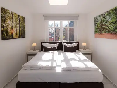 Ferienwohnung StrandLiebe Malchow - Schlafzimmer mit Doppelbett