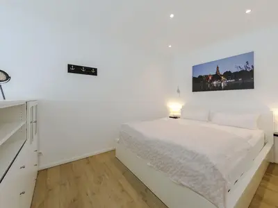 Ferienwohnung Nordlicht in Malchow Blick auf das Doppelbett