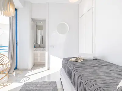 Zweites Schlafzimmer mit Einzelbett und einem Zusatzbett