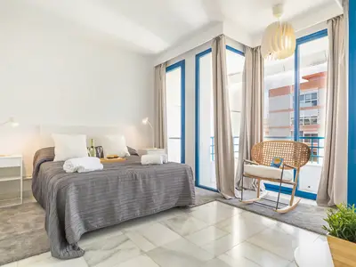 Hauptschlafzimmer mit Zugang zur Terrasse