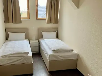 Schlafzimmer mit 2 Einzelbetten