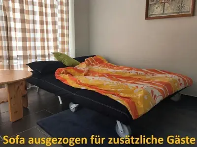 Sofabett ausgezogen für eine dritte Person