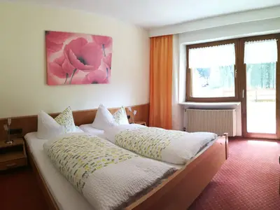 Schlafzimmer Ferienwohnung mit Terrasse