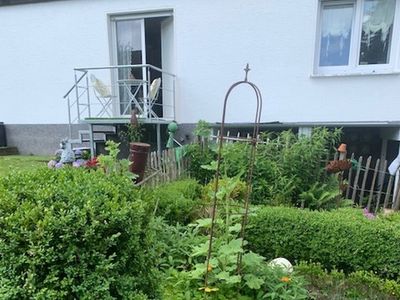 Rückseite Ferienwohnungen mit Garten- und Liege - Relax Außenanlage