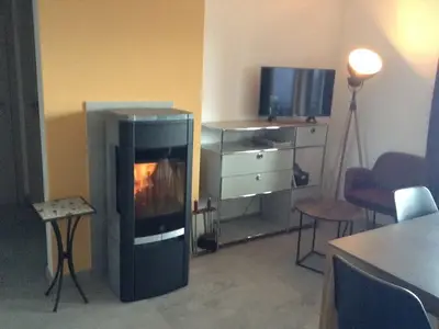 Wohn/Esszimmer mit Cheminée