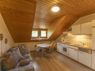 Küche mit Schlafgelegenheit
