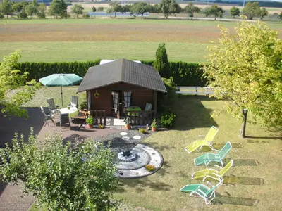 Gartenlaube mit Grillmöglichkeit