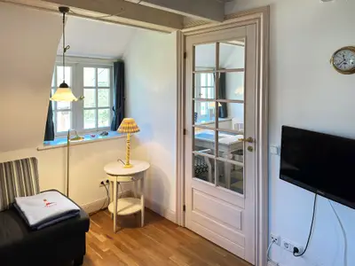 Wohnzimmer in der Ferienwohnung Hafis 9 in Nebel auf Amrum