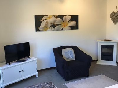 Wohnzimmer mit elektr. Kamin