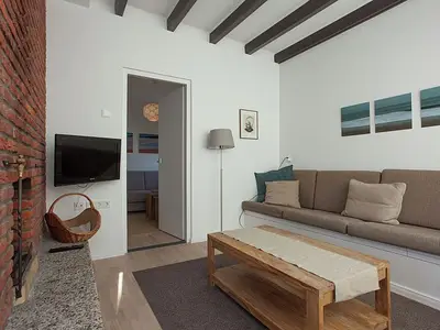 Wohnzimmer mit Kamin