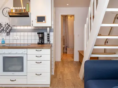 Küche und Wohnraum in der Wohnung Wiese & Watt