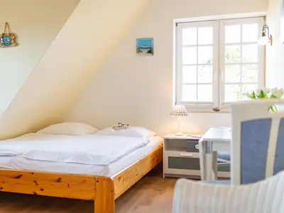 Doppelbett in der Ferienwohnung Wattstübchen in Norddorf auf Amrum