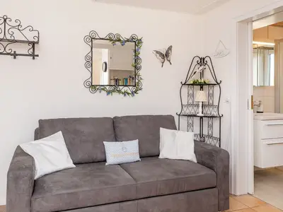 Sofa in der Wohnung Kleine Perle