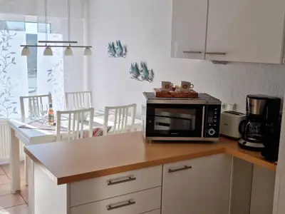 Wohn-/ Essbereich mit Küchenzeile