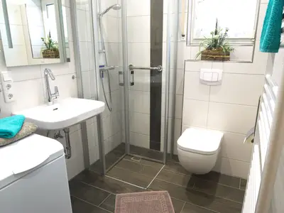 Badezimmer mit Waschmaschine