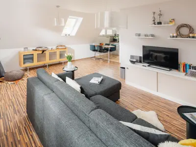 die insellotsen Norderney / Fewo Nordhelmeck 2 - Wohnzimmer