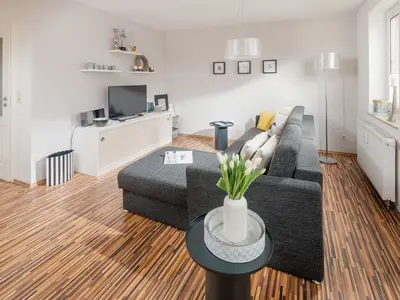die insellotsen Norderney / Fewo Nordhelmeck 2 - Wohnzimmer