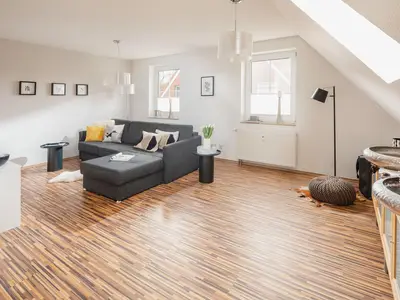 die insellotsen Norderney / Fewo Nordhelmeck 2 - Wohnzimmer