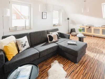 die insellotsen Norderney / Fewo Nordhelmeck 2 - Wohnzimmer