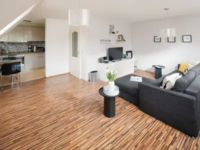 die insellotsen Norderney / Fewo Nordhelmeck 2 - Wohnzimmer