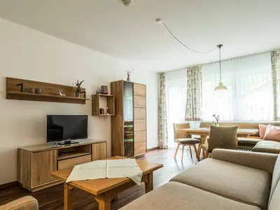 Der Wohn- und Essbereich in der Ferienwohnung D1