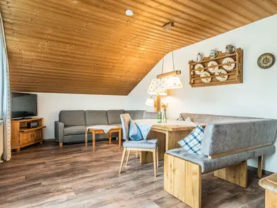 Der Wohn- und Essbereich in der Ferienwohnung D8