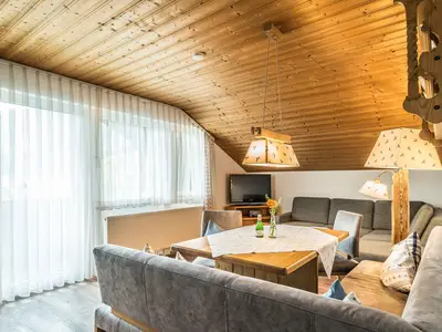 Wohn- und Essbereich in der Ferienwohnung D8