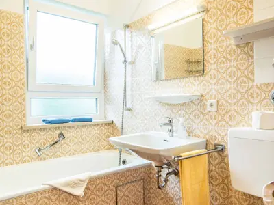 Das Badezimmer in der Ferienwohnung E4