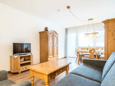 Der Wohn- und Essbereich in der Ferienwohnung E4