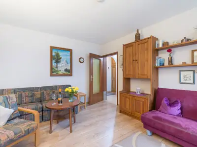 Der Wohn- und Essbereich in der Ferienwohnung Nr. B1