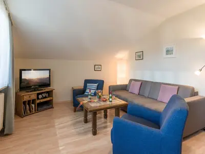 Der Wohn- und Essbereich in der Ferienwohnung Nr. F8