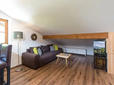 Gemütlicher Wohnbereich mit zusätzlicher Schlafcouch