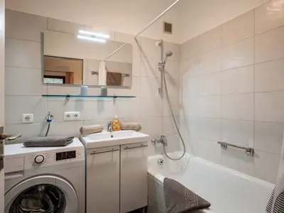 Badezimmer mit Waschmaschine