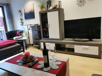 Wohnzimmer mit 4 Personen