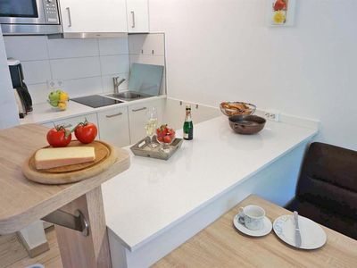 Ferienwohnung Weiherkopf - Küche mit Sitzgruppe