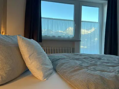 Schlafen mit Bergblick in kuscheligen Betten