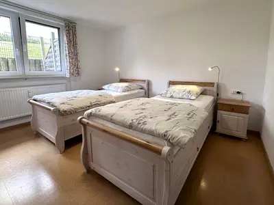 Einzelbetten im Allgäuer Landhausstil