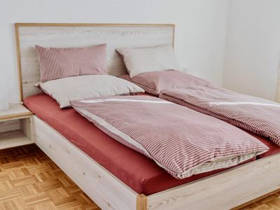 Appartement B - Schlafzimmer